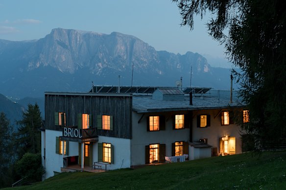 Sleek 1920s modernist architecture surrounded by pine forest at Hotel Briol, South Tyrol.