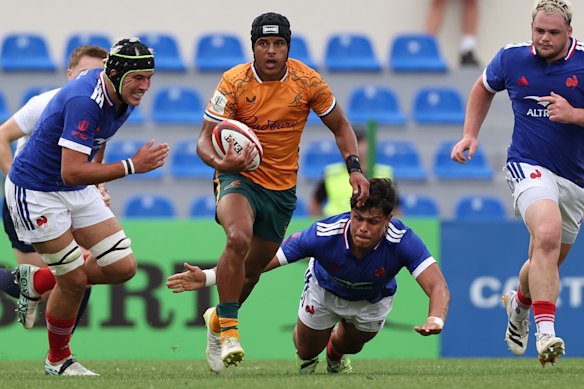 Trayvon Pritchard makes a break against France at the Junior World Championships.