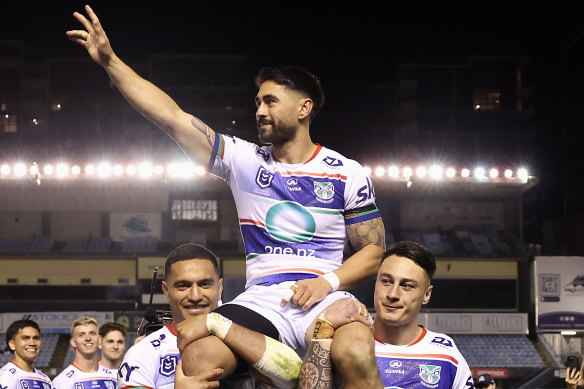 Shaun Johnson is carried off the field after playing his final NRL match.