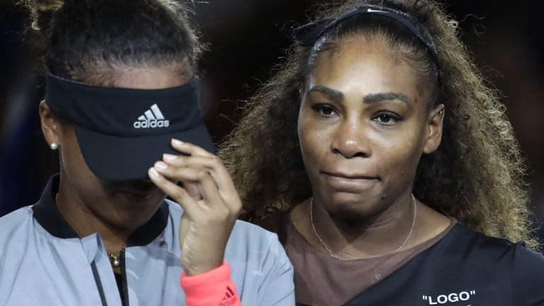 Serena Williams hugs winner Naomi Osaka after a controversial US Open final. 