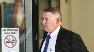 Former police officer Glen Coleman leaves Penrith Courthouse with his wife.