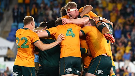 The Wallabies celebrate beating South Africa in 2021.