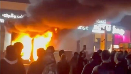 A fire broke out during a protest in Tehran, Iran, at AEDT on Saturday.
