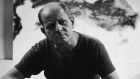 Jackson Pollock in his studio with his dog in 1953, the year after he painted Blue Poles.