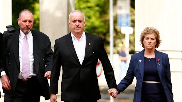 Grace's parents David and Gillian Millane arrive with Detective Inspector Scott Beard, left, at the Auckland High Court on Wednesday.