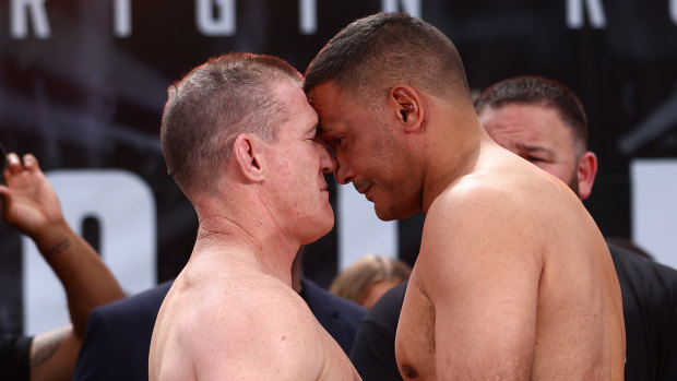 Paul Gallen and Justin Hodges get up close and very personal at Wednesday’s weigh in.