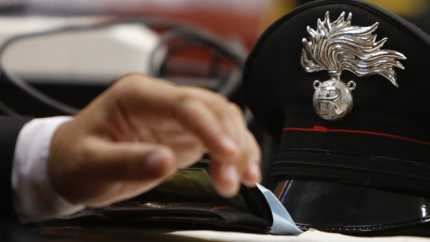 The hat of Carabinieri paramilitary police in court.