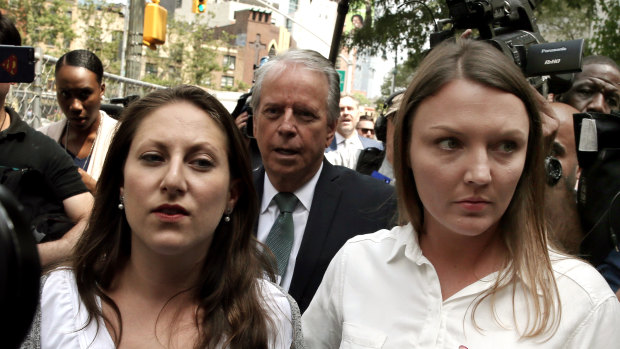 Michelle Licata, left, and Courtney Wild, alleged victims of Jeffrey Epstein, outside the federal court in New York on Monday.