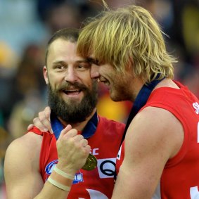 Lewis Roberts-Thomson embraces Nick Malceski after achieving the ultimate success.