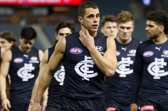 Ed Curnow leaves the field after his 200th match in round 19. 