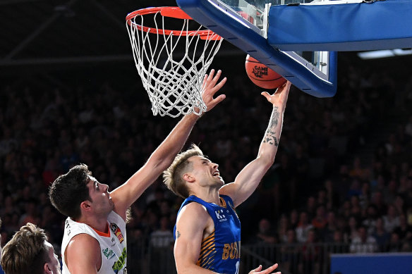 Nathan Sobey of the Bullets scores points during the Round 20 NBL match between the Brisbane Bullets and Cairns Taipans.