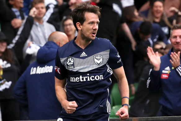 Melbourne Victory striker Robbie Kruse celebrates after opening the scoring against Newcastle. 