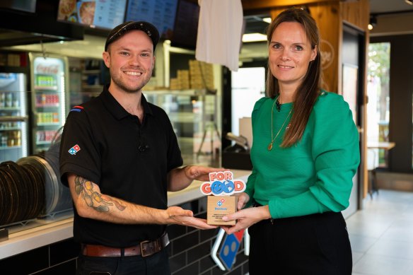 Domino’s chief environment, social and governance officer Marika Stegmeijer (right) says it’s a common misconception pizza boxes can’t be recycled.