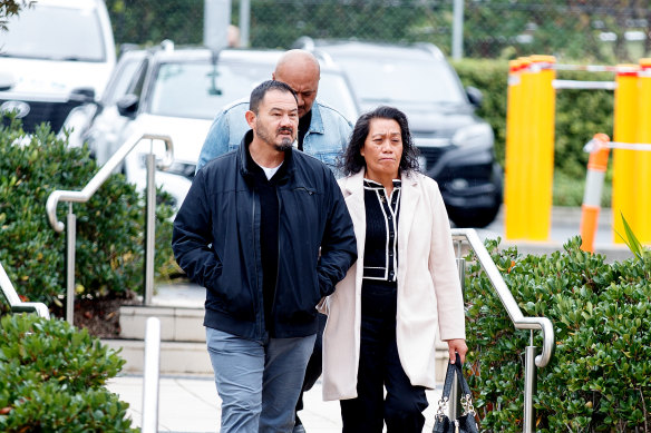 Titmuss’ parents arrive at Lidcombe Coroners Court on Friday.