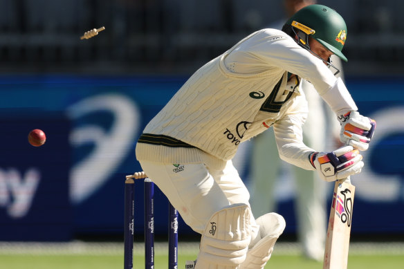 Alex Carey is bowled to seal Australia’s defeat.