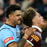 Latrell Mitchell pushes Reece Walsh over during game 2 of Origin at the MCG.