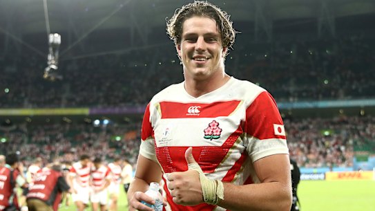 Stoked: Aussie James Moore celebrates Japan's 19-12 victory over Ireland at the Rugby World Cup. 
