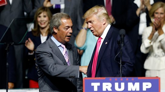 Donald Trump welcomes Nigel Farage to the podium during the 2016 election campaign.