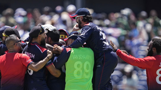 USA players celebrate their remarkable victory over Pakistan.
