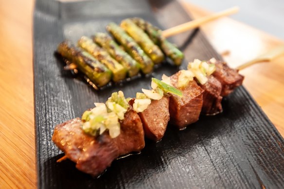 Asparagus and wagyu tongue skewers.