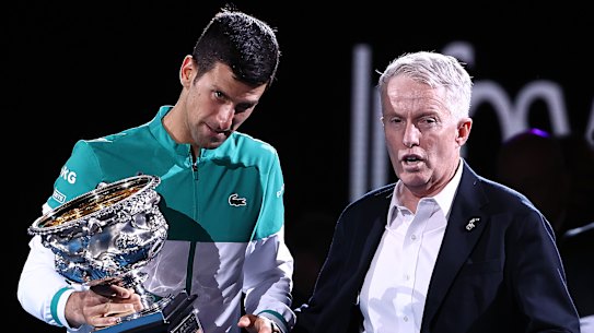 Novak Djokovic with Tennis Australia boss Craig Tiley at the Australian Open in February last year.