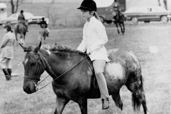Caroline Kennedy, daughter of the late US president John F. Kennedy rides her pony, Macaroni, in 1966.
