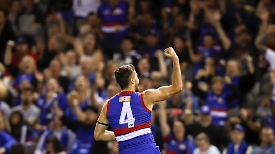 MELBOURNE, AUSTRALIA - MARCH 28: Marcus Bontempelli of the Bulldogs celebrates a goal during the 2021 AFL Round 02 match between the Western Bulldogs and the West Coast Eagles at Marvel Stadium on March 28, 2021 in Melbourne, Australia. (Photo by Dylan Burns/AFL Photos via Getty Images)
