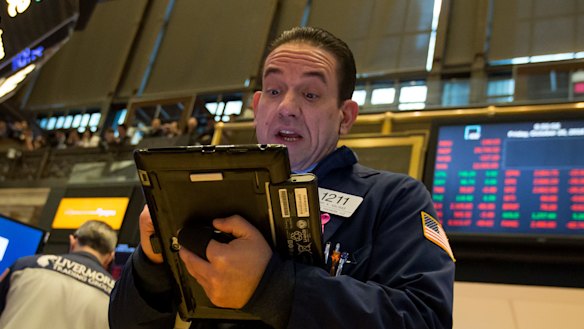 The declines on Wall Street gathered speed on Friday, pushing the market to the brink of a correction.