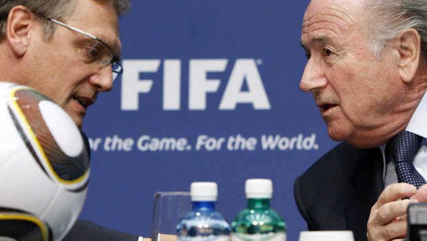 Fall from grace: Jerome Valcke, left, with former FIFA  boss Sepp Blatter.