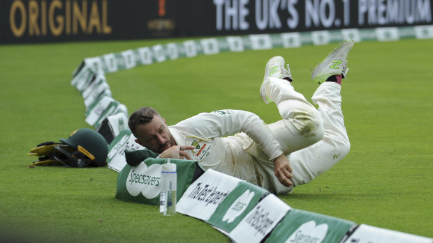 Former Test wicketkeeper Matthew Wade giving his all in the field.