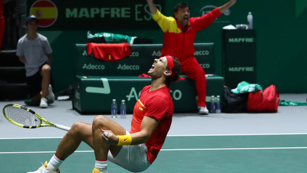 Rafael Nadal celebrates match point in his semi-final doubles match with Feliciano Lopez against Jamie Murray and Neal Skupski of Great Britain.