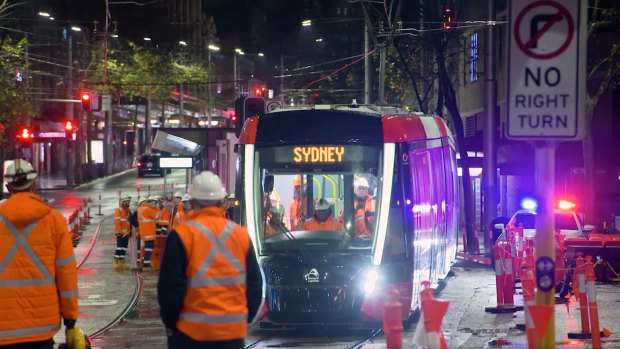 Night-time testing of a tram on George Street.