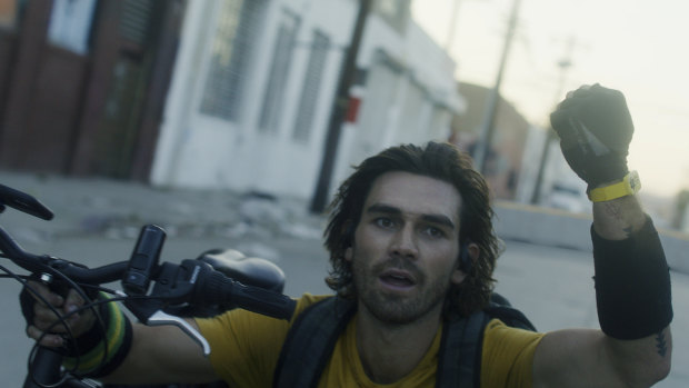 Motorcycle courier Nico (KJ Apa) is one of the few souls allowed outside as a pandemic takes over.