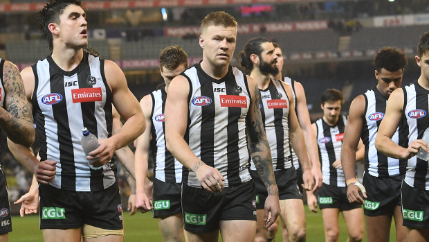 Jordan De Goey (centre) is the latest Collingwood star to be struck down with a soft-tissue injury.