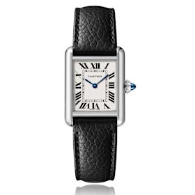 A Cartier “Tank” watch ensures 
Keenan stays stylish and punctual.  