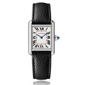 A Cartier “Tank” watch ensures 
Keenan stays stylish and punctual.  