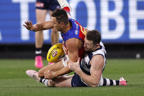 The tackle in question: Dangerfield on McCluggage.