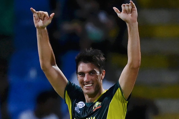 Pat Cummins celebrates his hat-trick against Bangladesh.