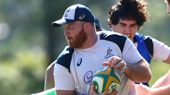Matt Gibbon carts the ball up during Wallabies training.
