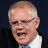 A victorious Scott Morrison  takes to the stage on election night.