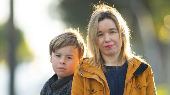 Becky McDonagh and her son Harry. Harry attends St Joseph’s, one of four Catholic schools that might close.