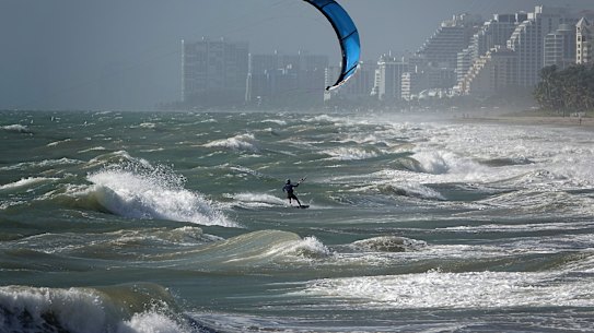 Tropical Storm Marco began falling apart Monday, easing one threat to the Gulf Coast but setting the stage for the arrival of Laura as a potentially supercharged hurricane.