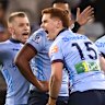 Sid Harvey (15) celebrates with the Waratahs players after fulltime.