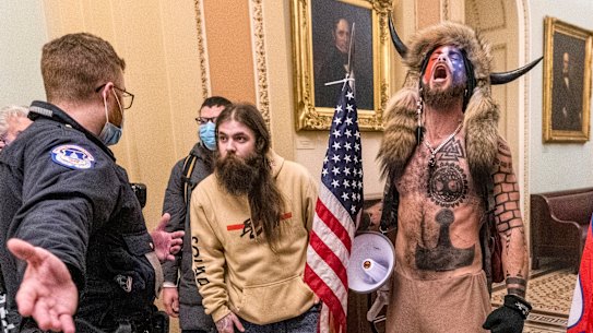 Jacob Chansley, wearing the horned hat, was identified by Rusty Bowers during his evidence at the Capitol riot hearings.