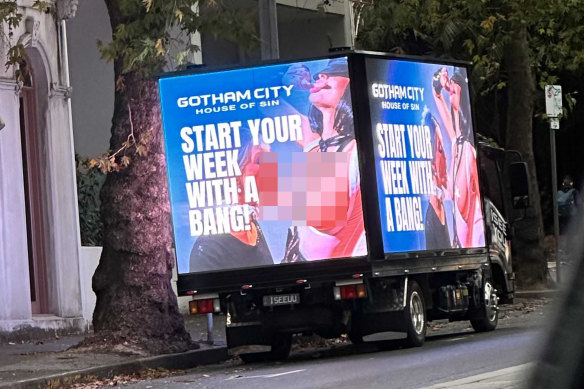 A mobile billboard for the Gotham City brothel is being driven around Melbourne showing a slideshow of graphic imagery. Image has been censored.