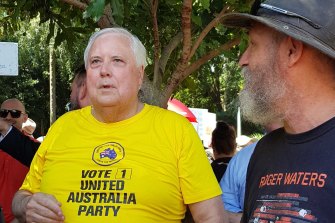 Clive Palmer (centre) attended the Brisbane rally on Saturday.