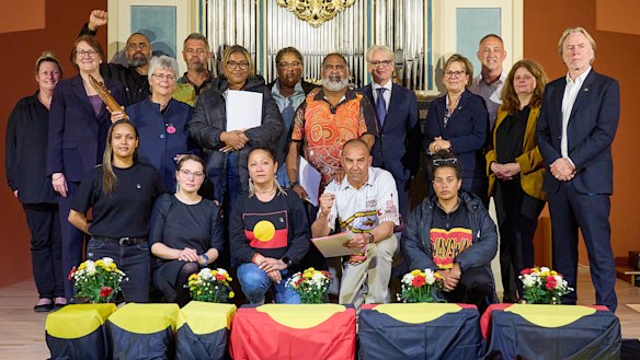 Members of the First Peoples delegation and officials at the ceremony in Leipzig. 