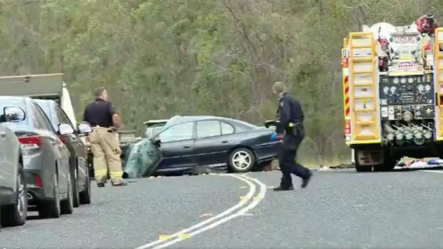 Emergency services respond to the triple fatal car crash in Bundaberg on Sunday.