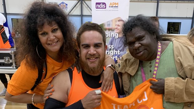 Senator Malandirri McCarthy with her son, CJ, and Miriam Charlie.