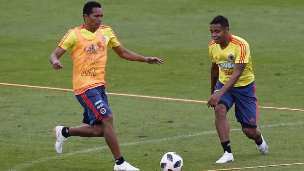 Carlos Bacca, left, and Luis Muriel train in preparation for the World Cup.